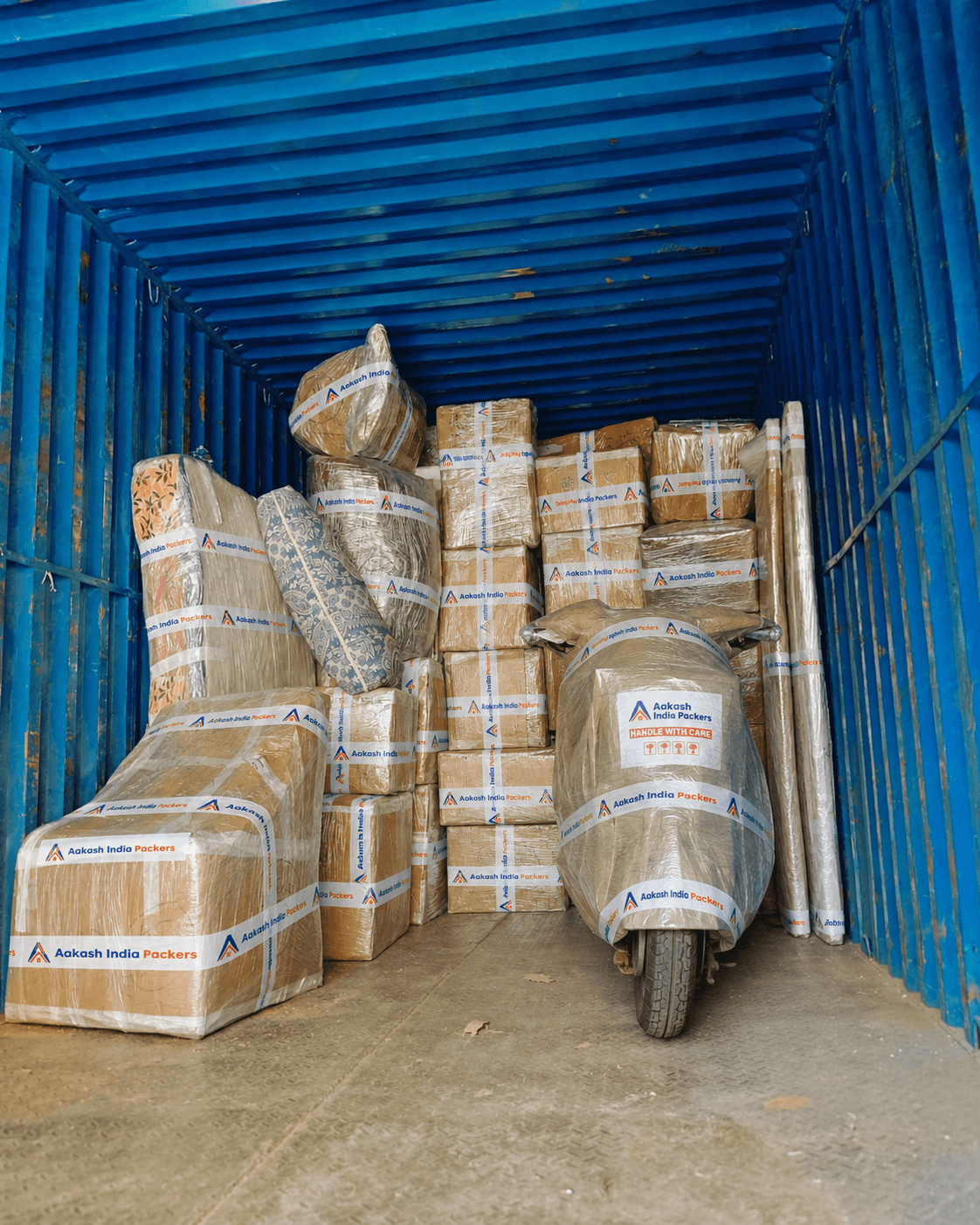Bike and household goods packed inside container